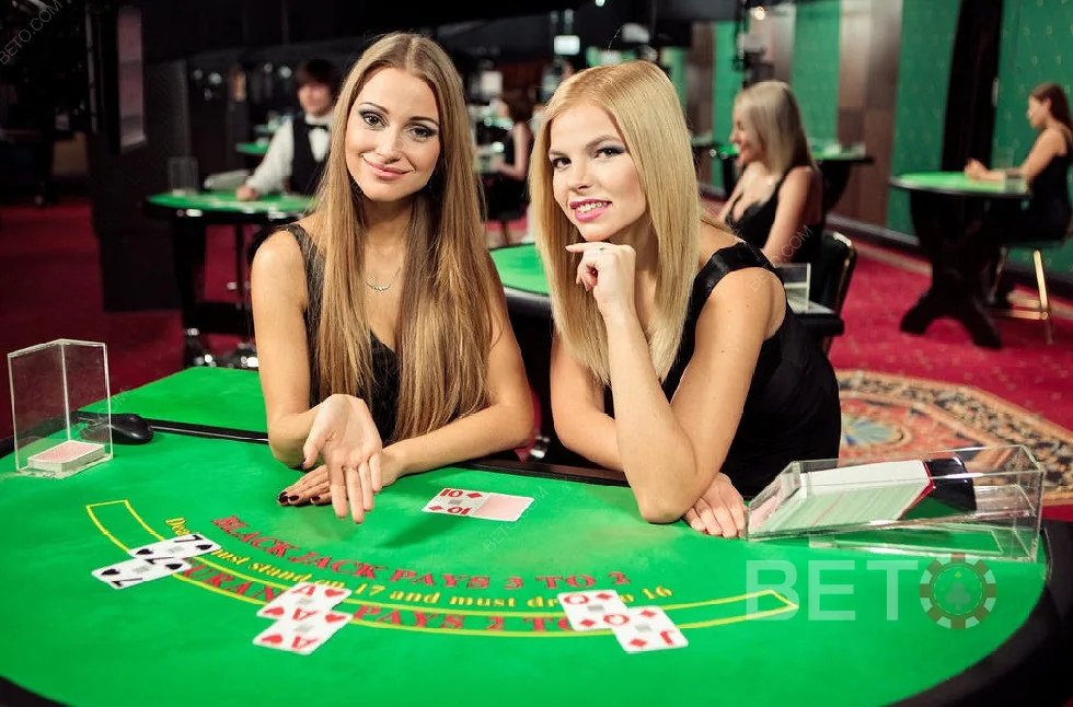 Meja permainan live dengan dealer dan layar permainan